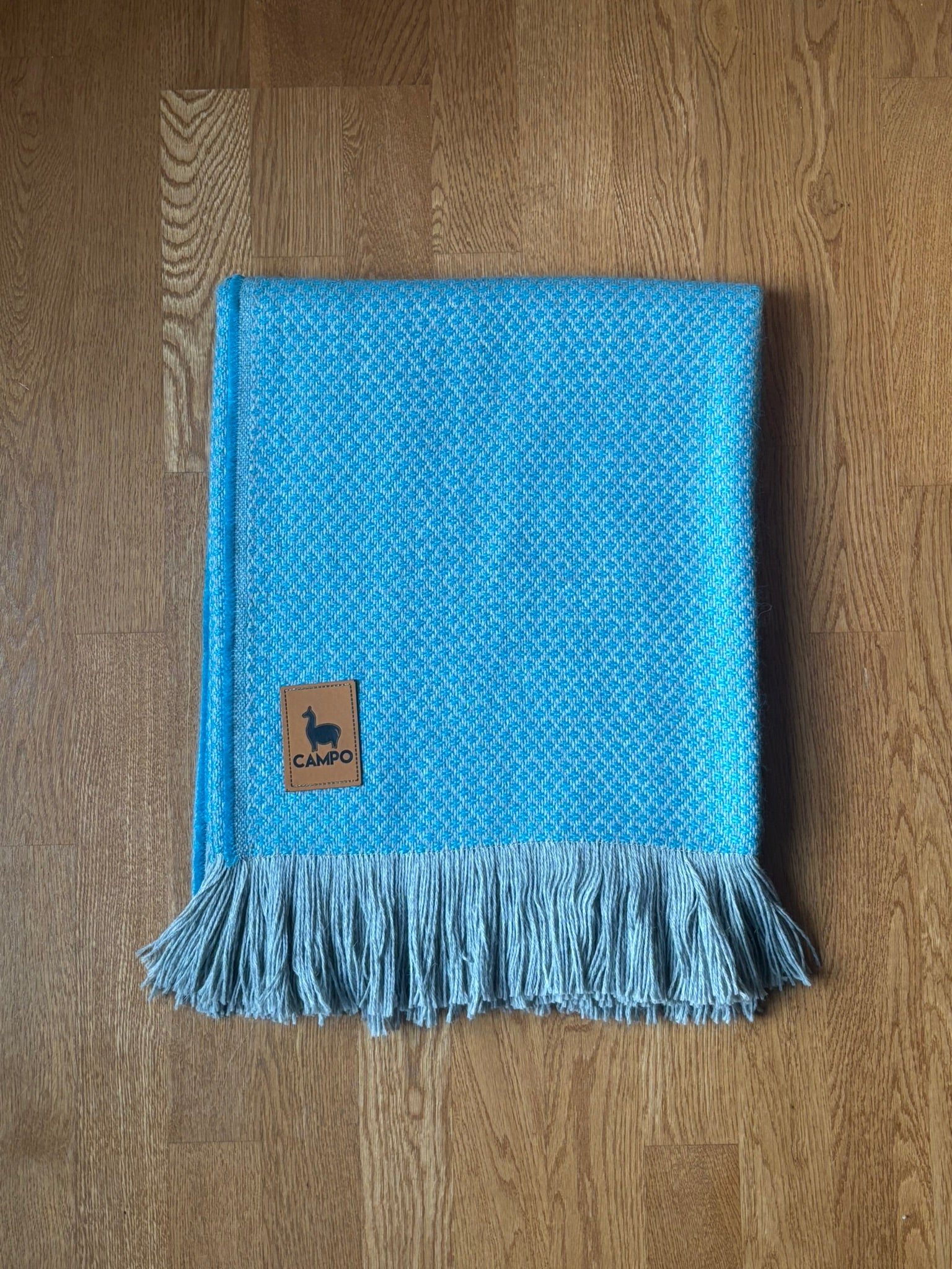 Light Blue Campo Alpaca Minimalist Woven Throw Blanket – Carlos design made from soft, natural alpaca fiber