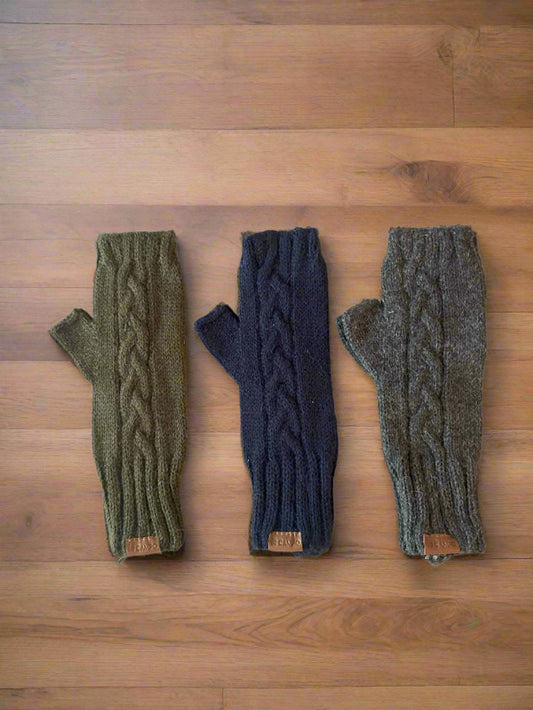 A set of fingerless mittens in cable knit design. They come in three colors: green, blue, and gray.