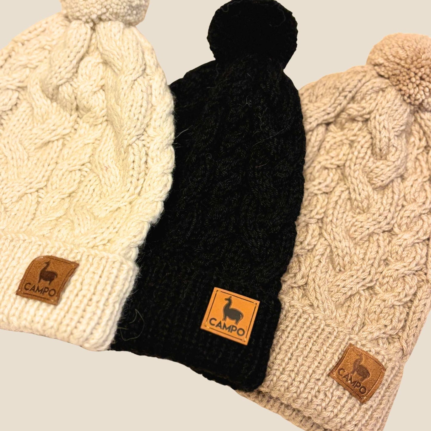 White, Black and Tan Indecita beanies Close Up