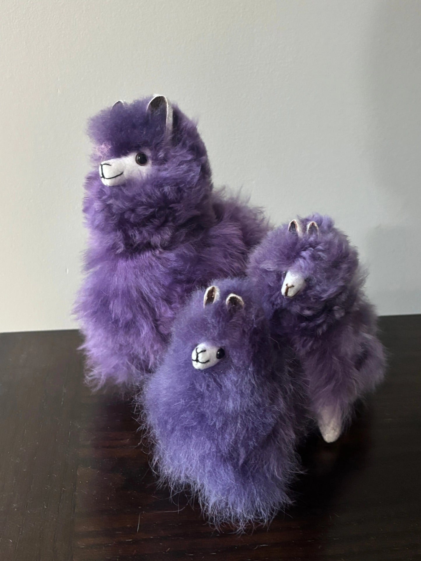 3 sizes of purple alpaca fluffies: Small, Medium, Large