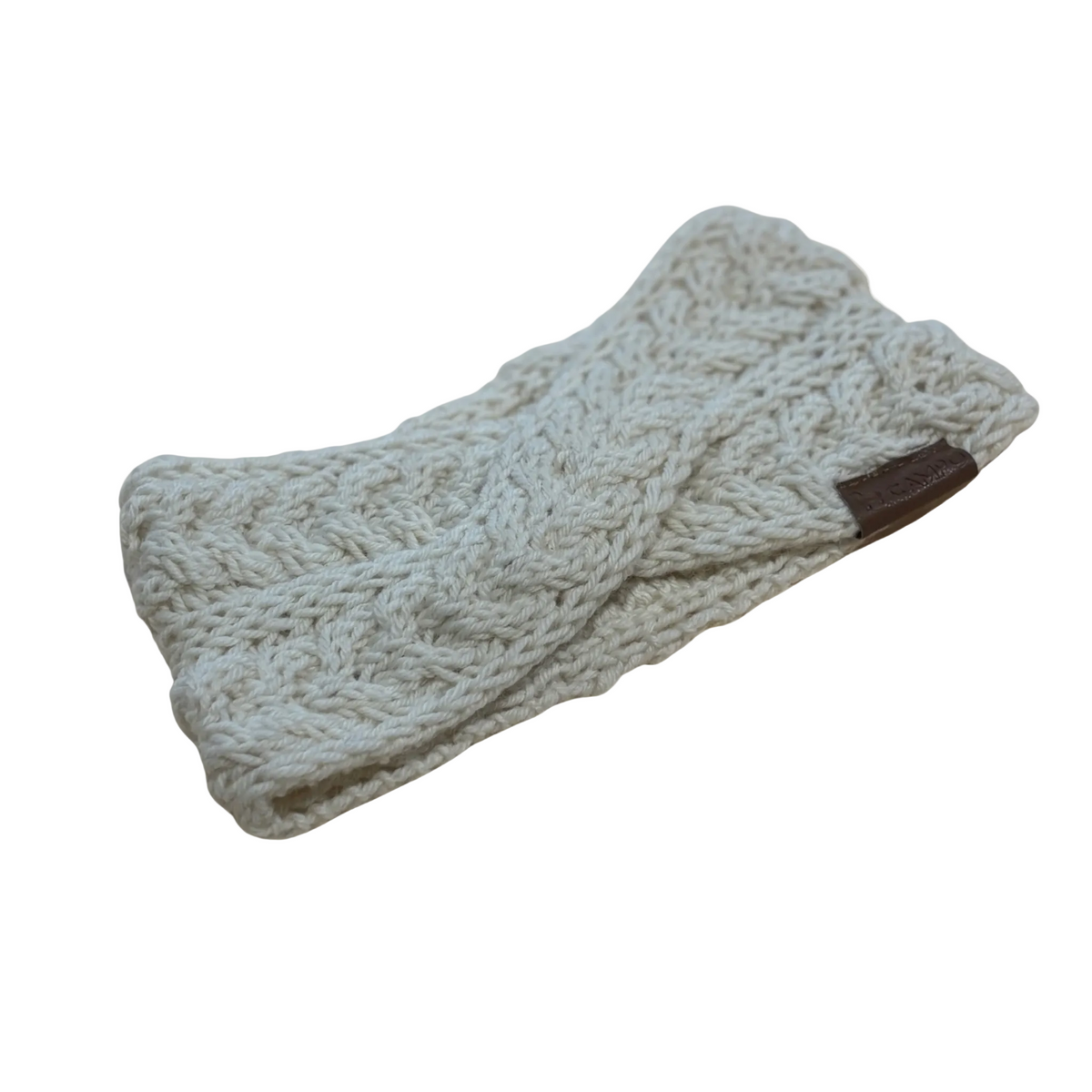 Knitted headband on a beige background