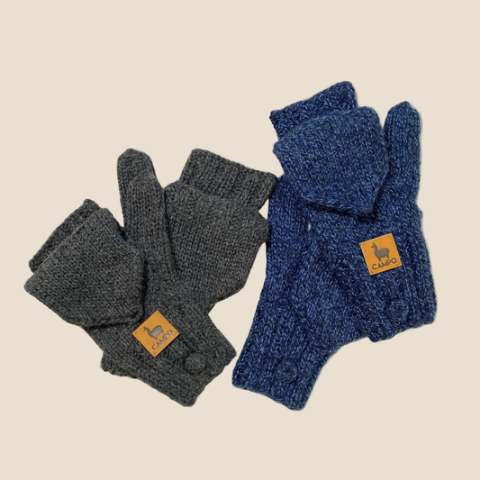 Pair of gray and blue gloves with brand logo on a beige background