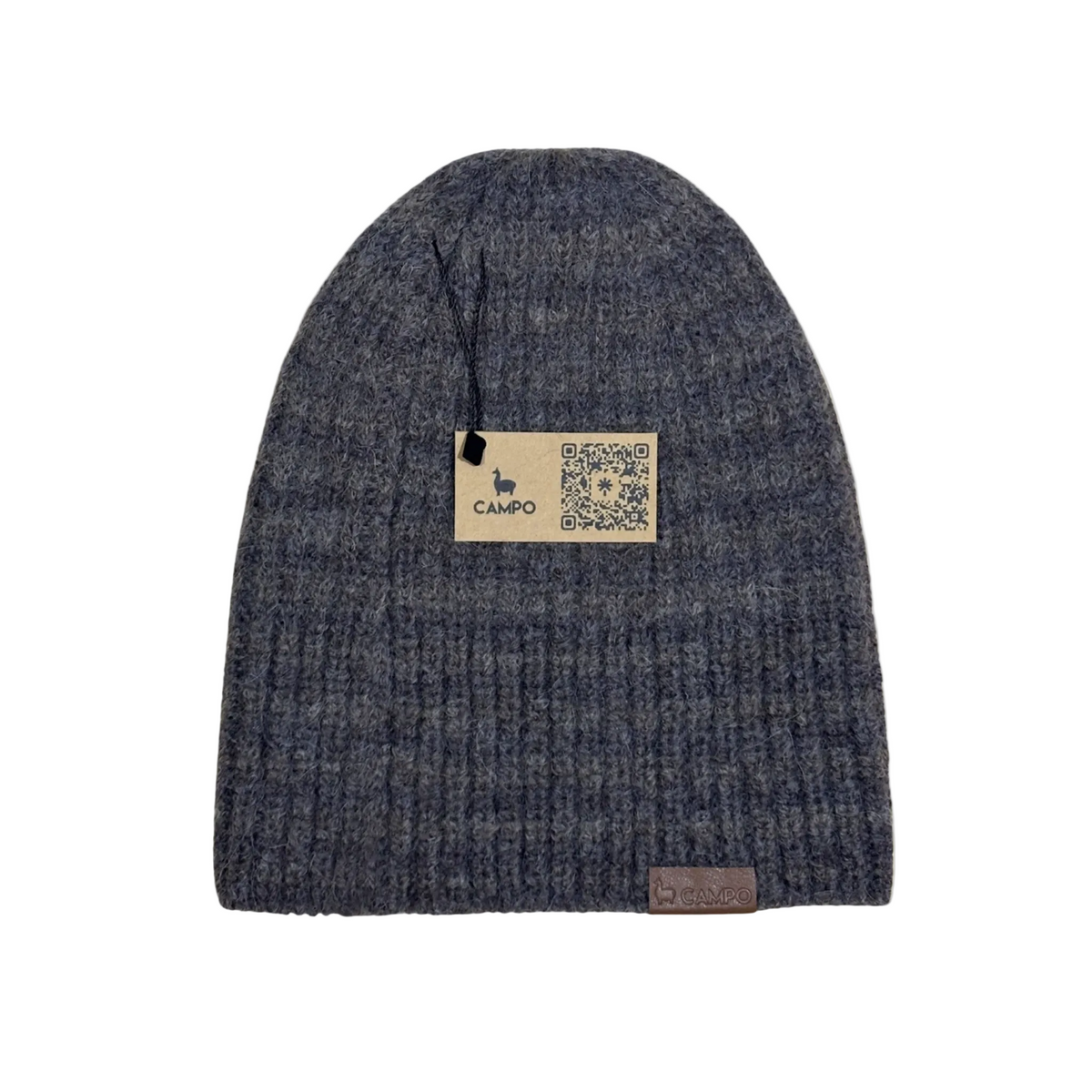 Blue knit beanie with a 'Campo' label on a beige background