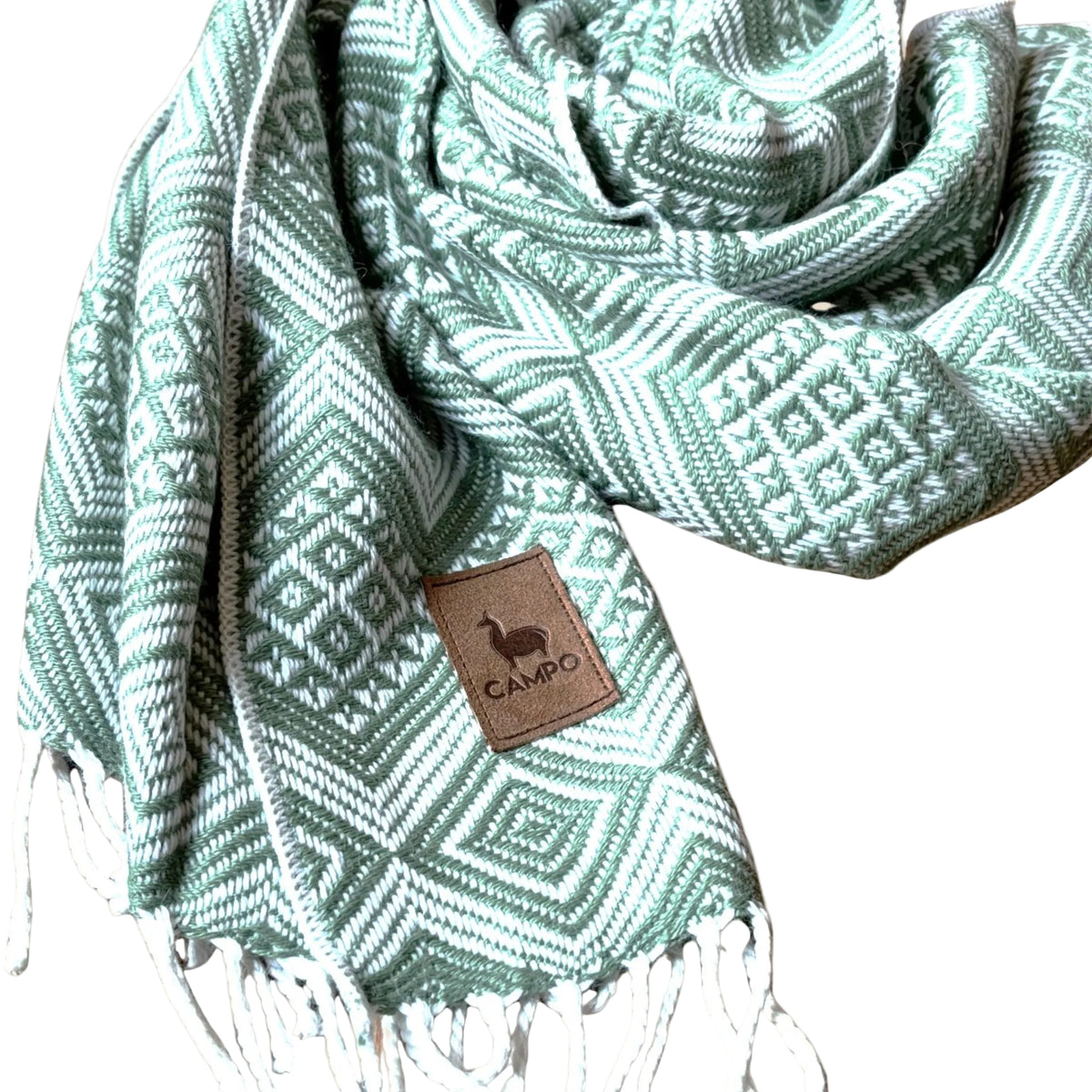 Sage patterned scarf with a brand tag on a beige background