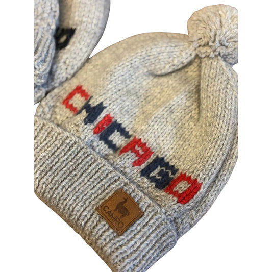 Knitted hat with 'CHICAGO' text and Campo logo on a beige background