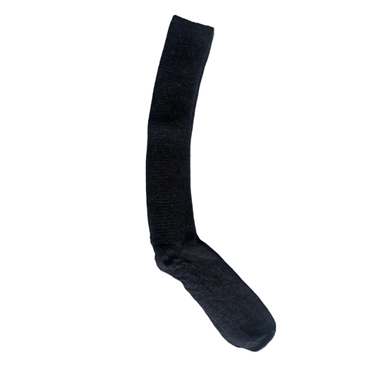 Black sock on a gray surface