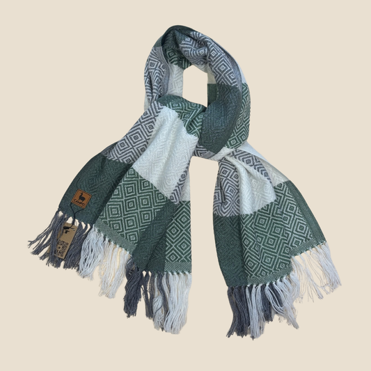 Woven scarf with geometric pattern and fringes on a beige background