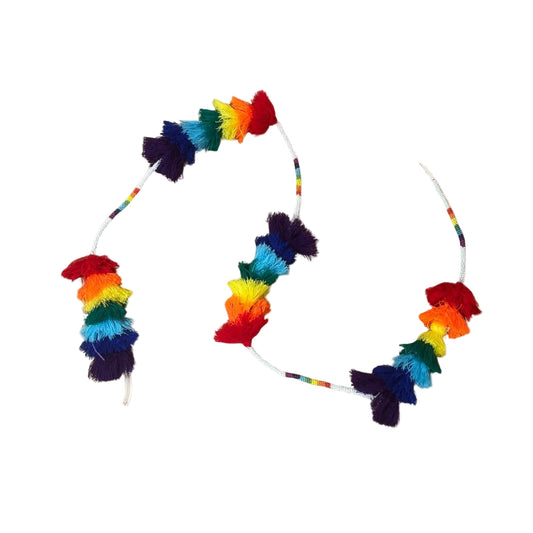 Colorful hoop home decor with rainbow and multicolor design on a beige background
