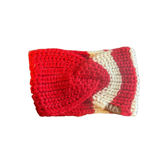 Red and white crocheted headband on a beige background