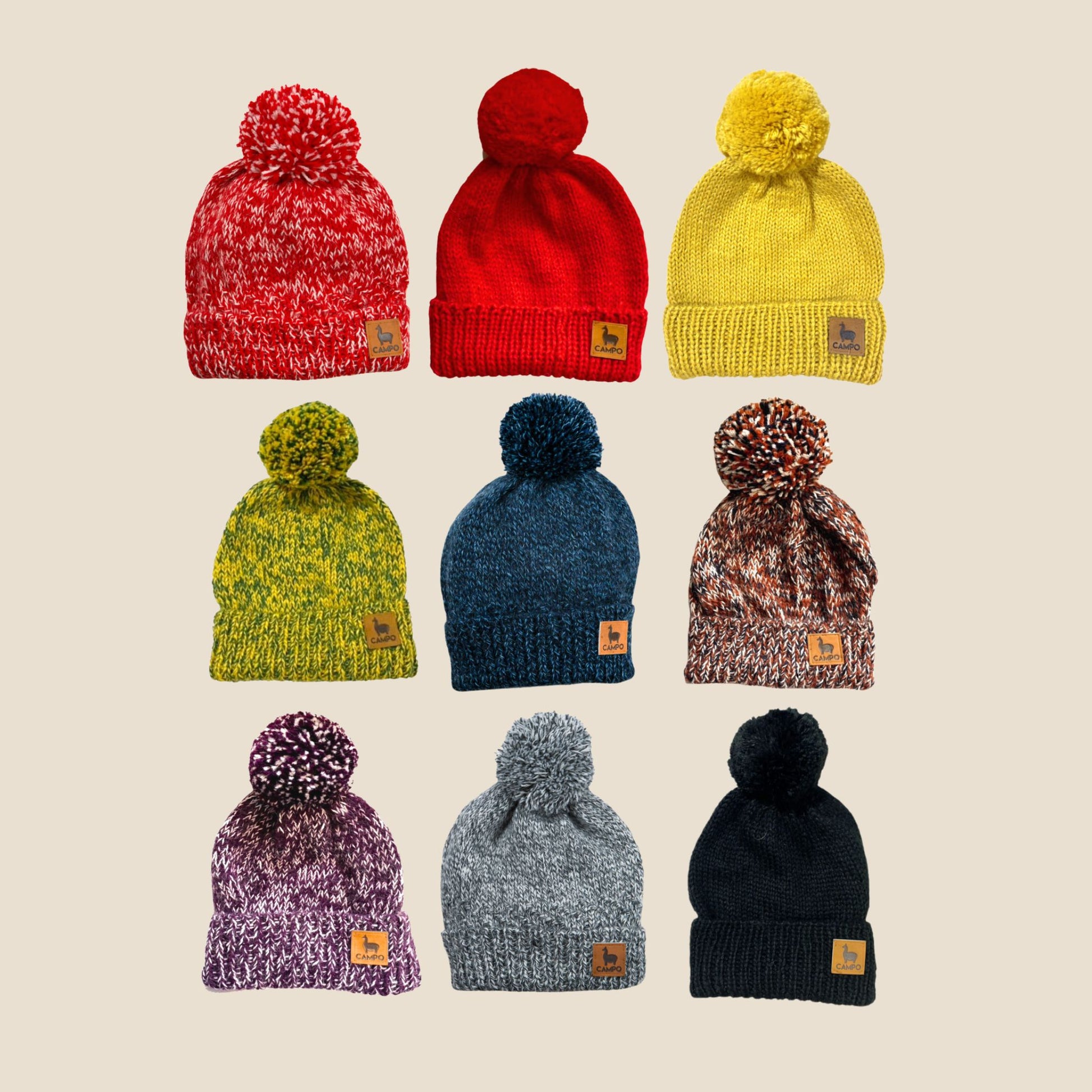 Nine colorful knit hats with pom-poms arranged in a 3x3 grid on a beige background.