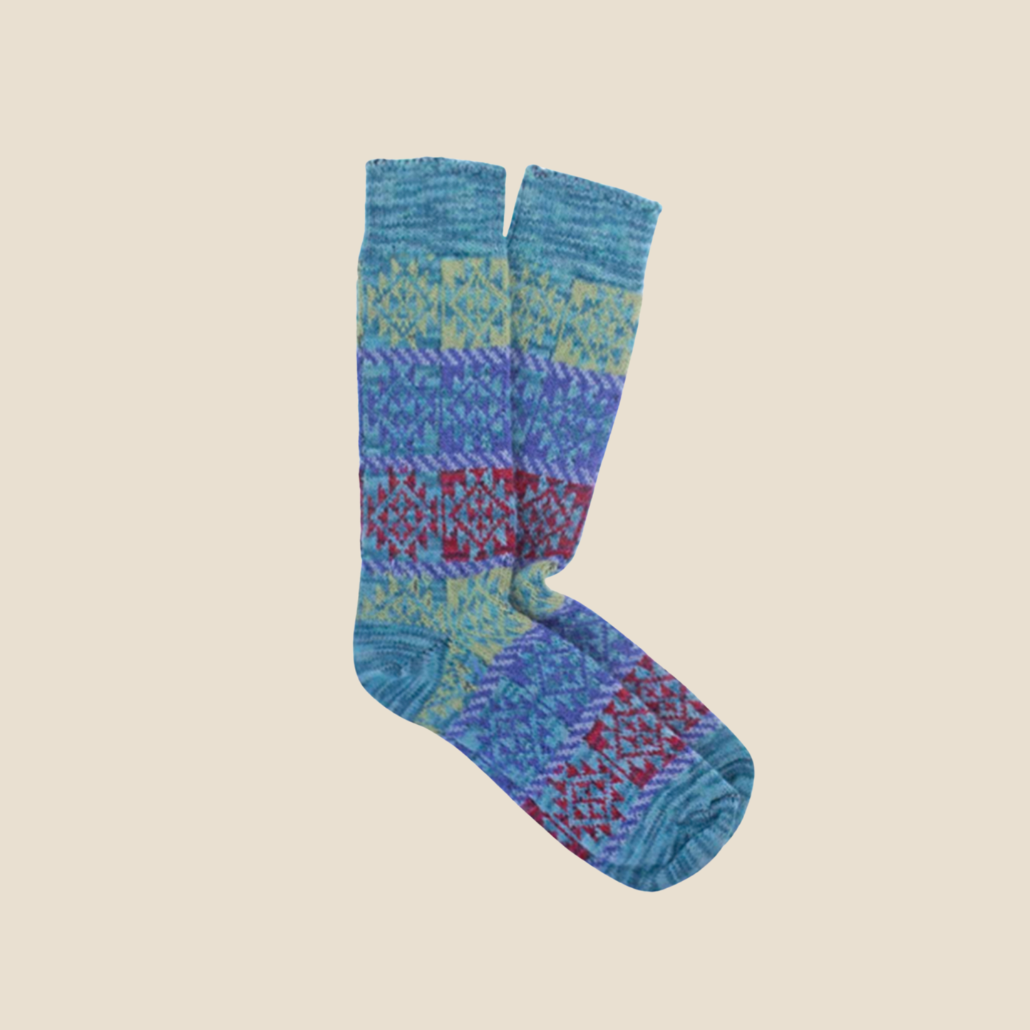 Teal knitted sock on a beige background
