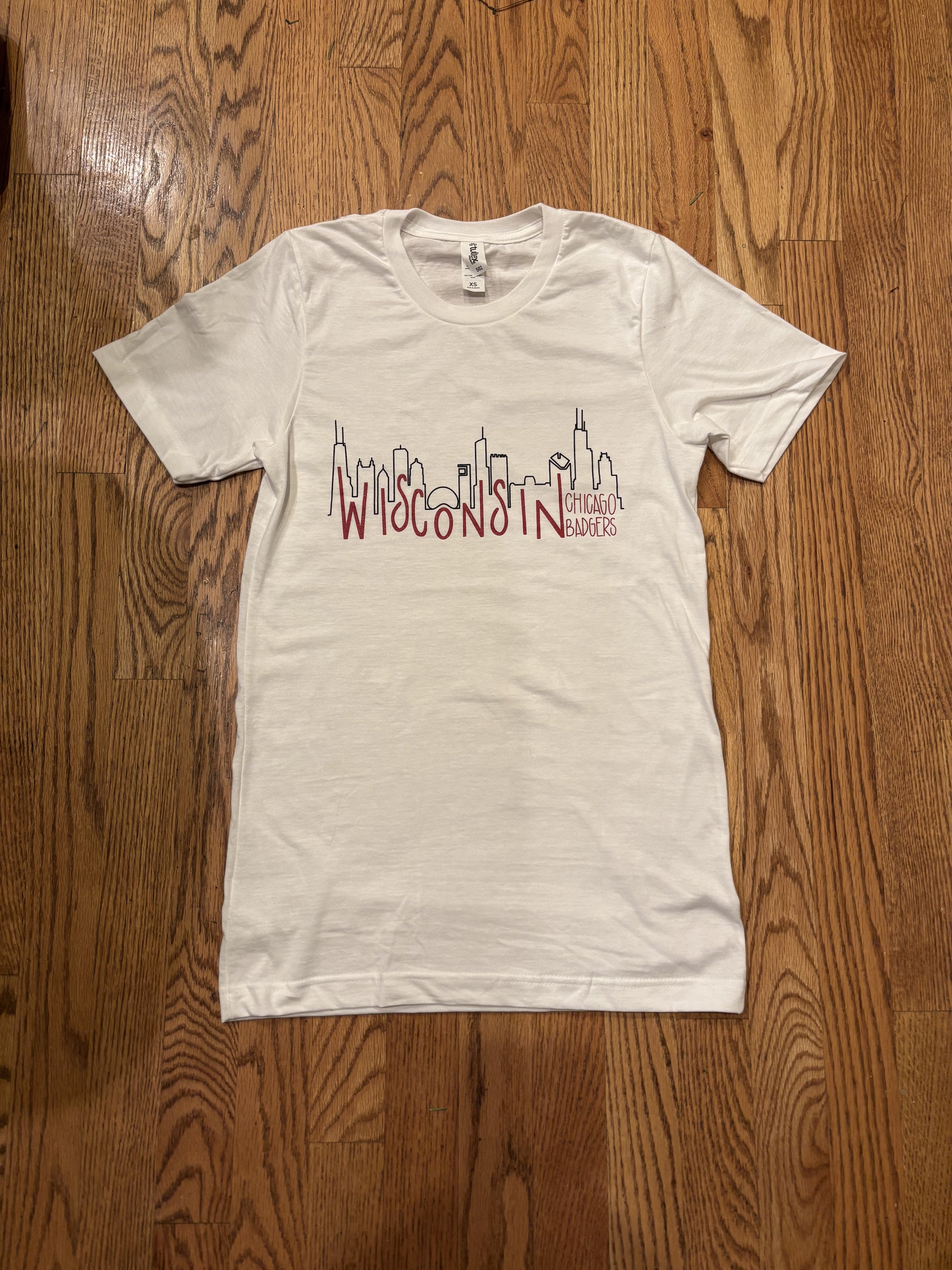 White Wisconsin Chicago Badgers T-Shirt by Campo Alpaca made from soft, breathable cotton with bold Chicago Badgers graphic