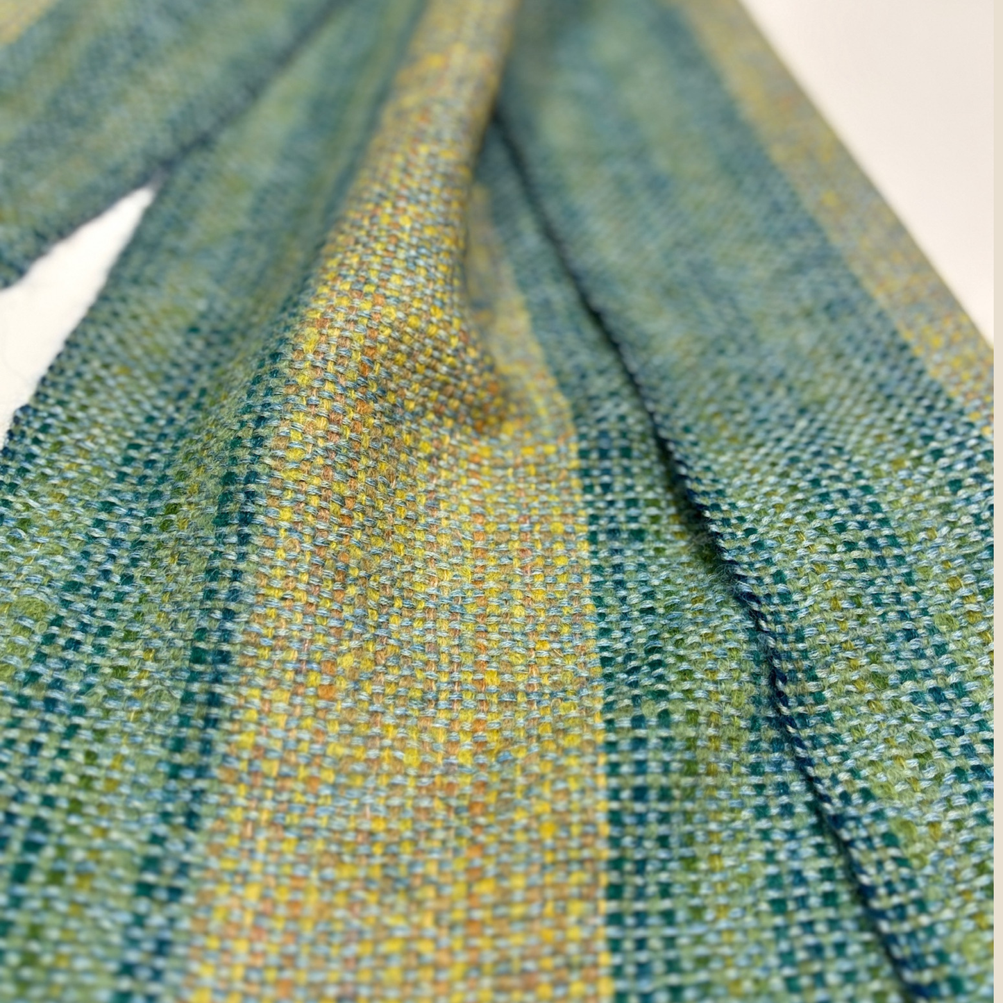 Close-up of green and yellow woven fabric