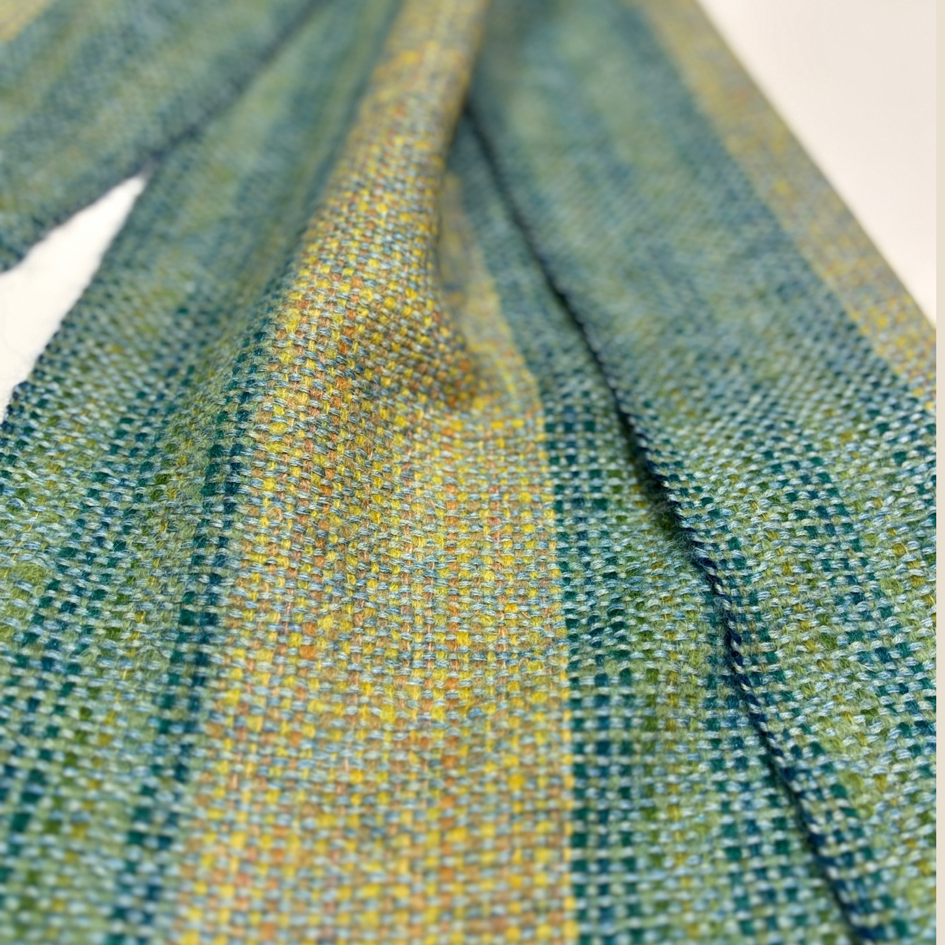 Close-up of green and yellow woven fabric