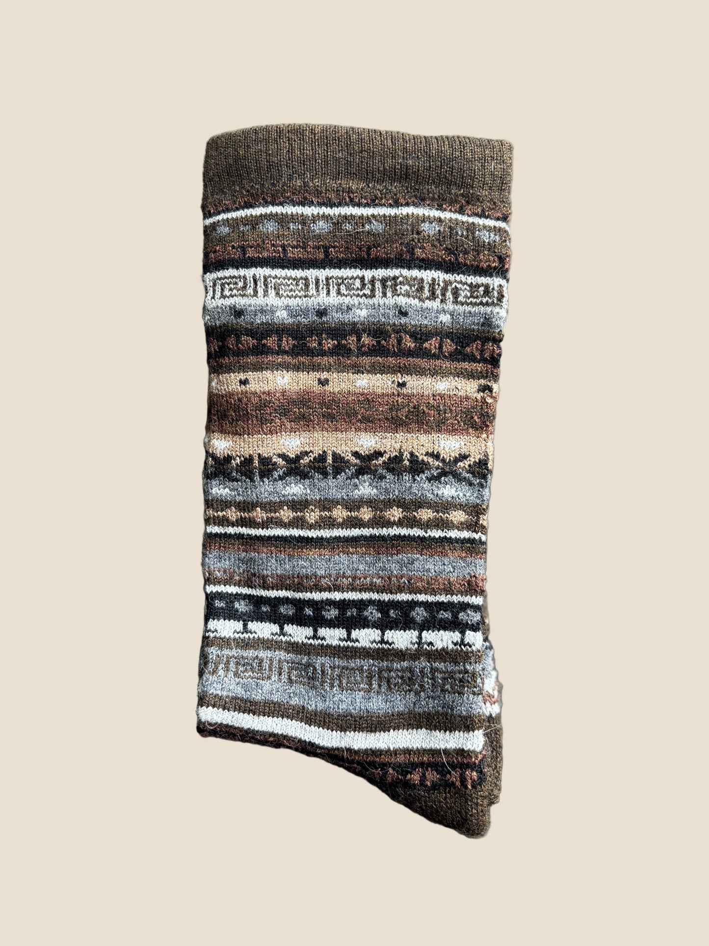 Patterned sock on a textured gray background