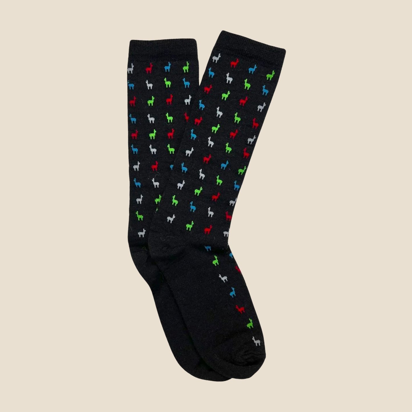 Black socks with colorful alpaca pattern on a beige background
