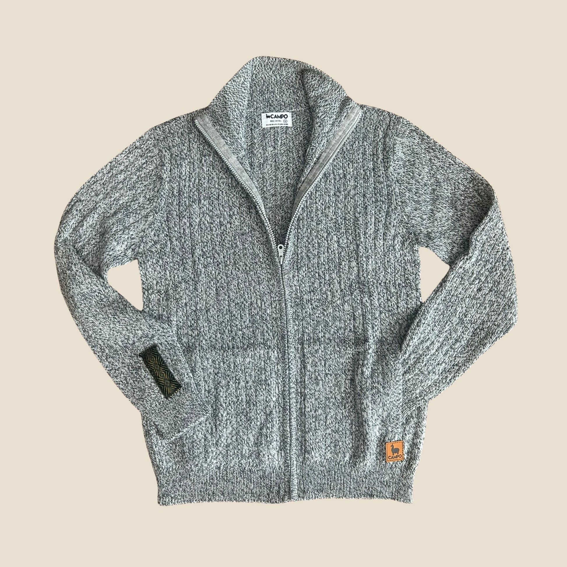 Salt and pepper zip-up sweater with Campo logo on a beige background