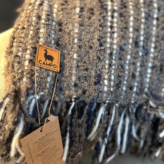 Textured fabric with a 'Camilo' brand tag