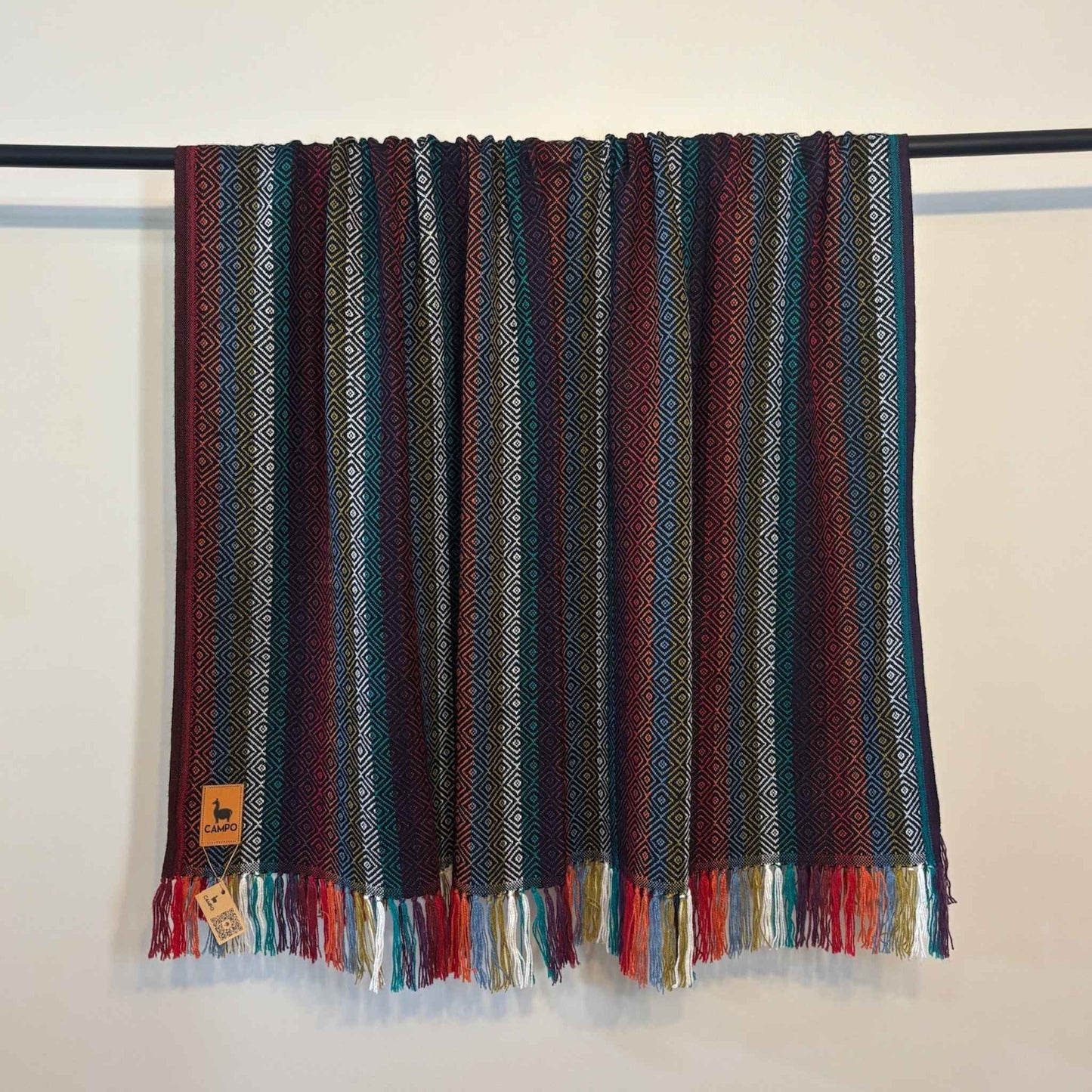 Black multi with colorful pattern and fringes on a white background