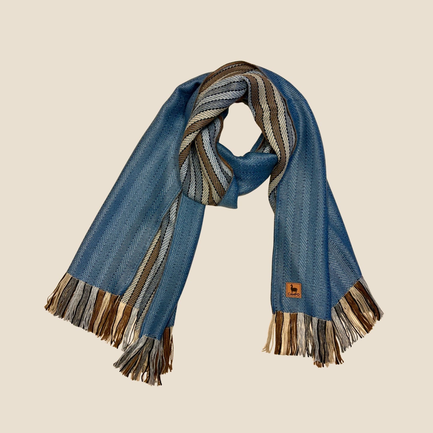 Light blue scarf with brown and gray stripes on a beige background