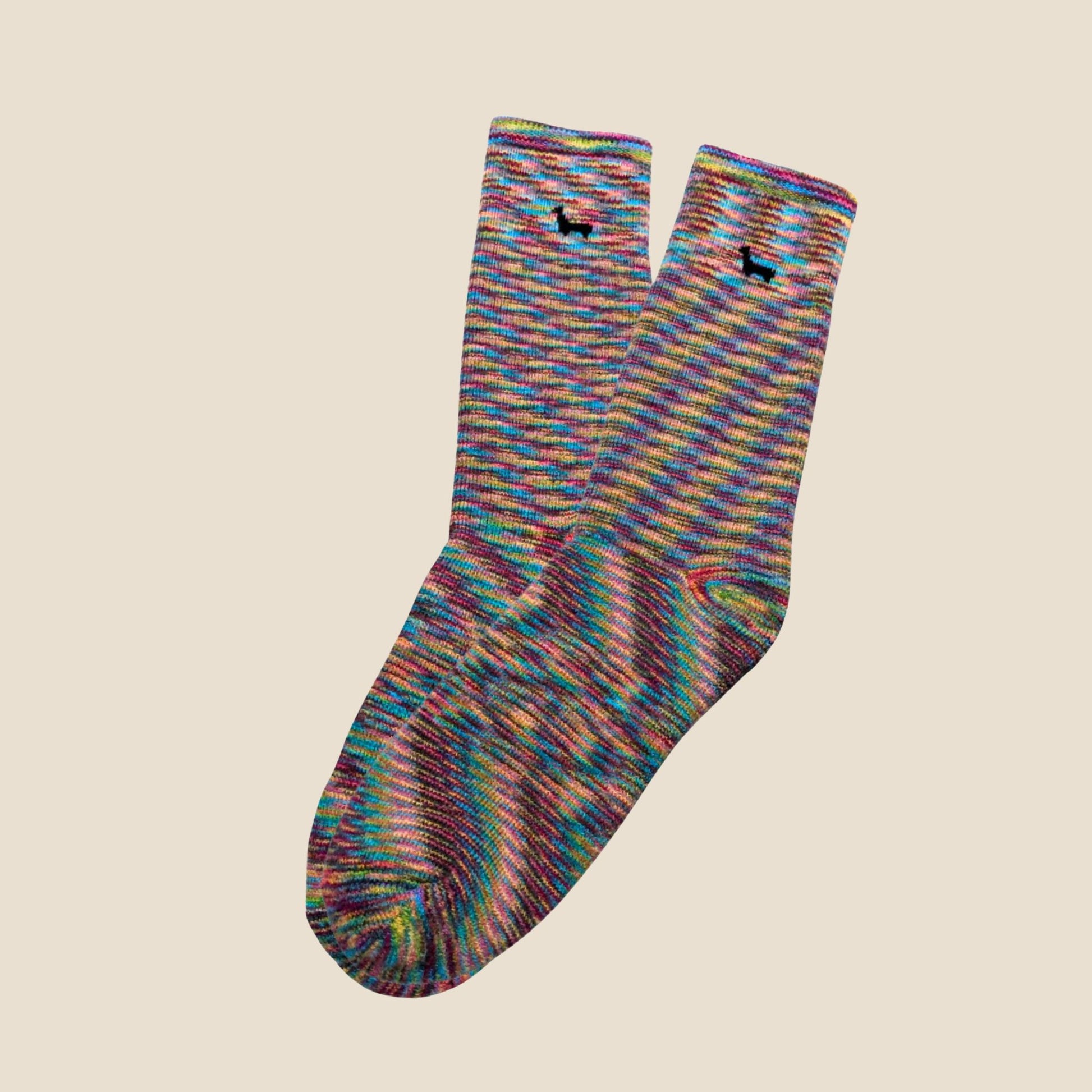 Multicolored sock with a pattern on a beige background