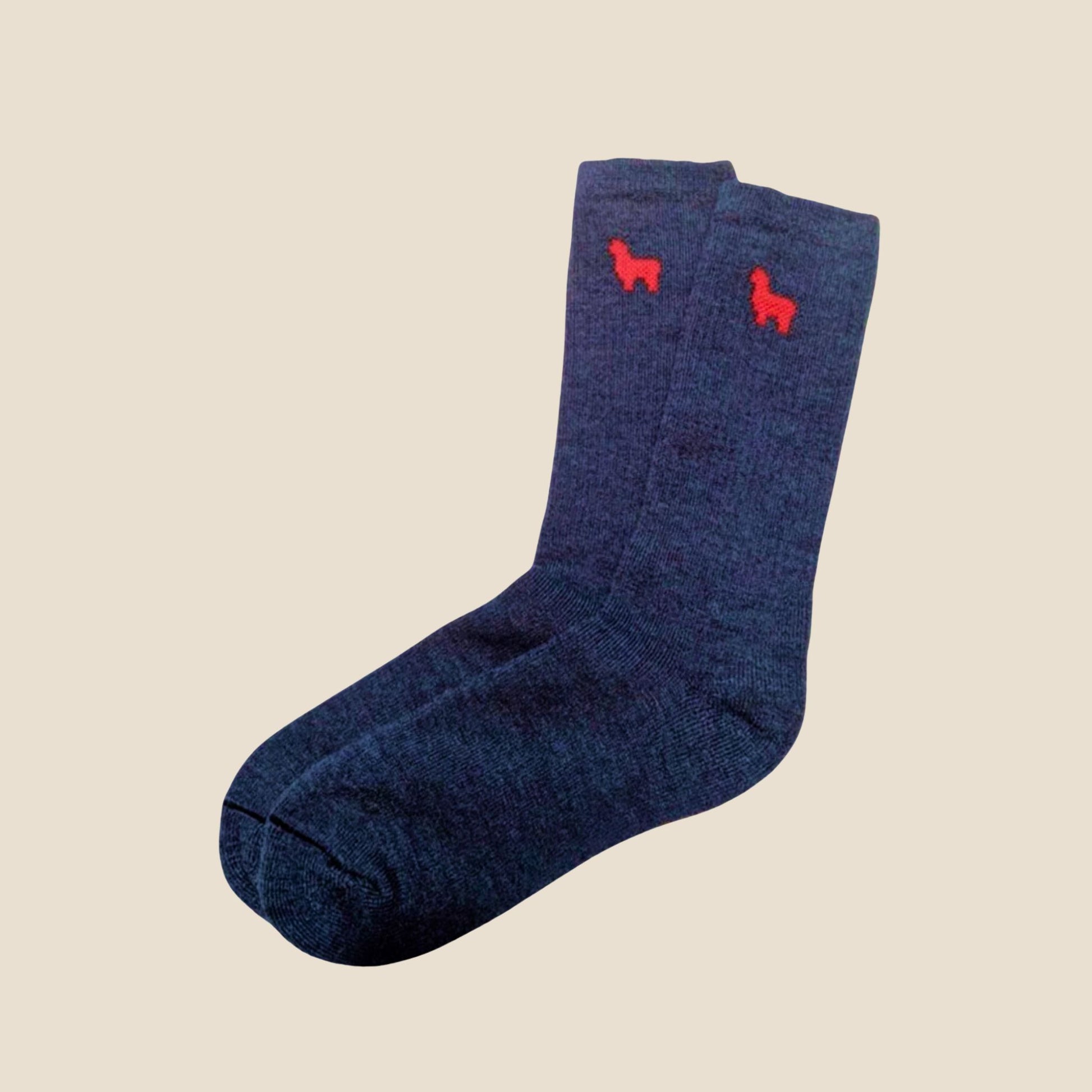 Denim sock with red alpaca design on a beige background