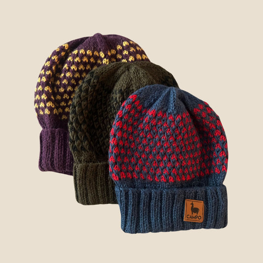 Three knit hats in purple, green, and blue with a visible Campo logo on a beige background