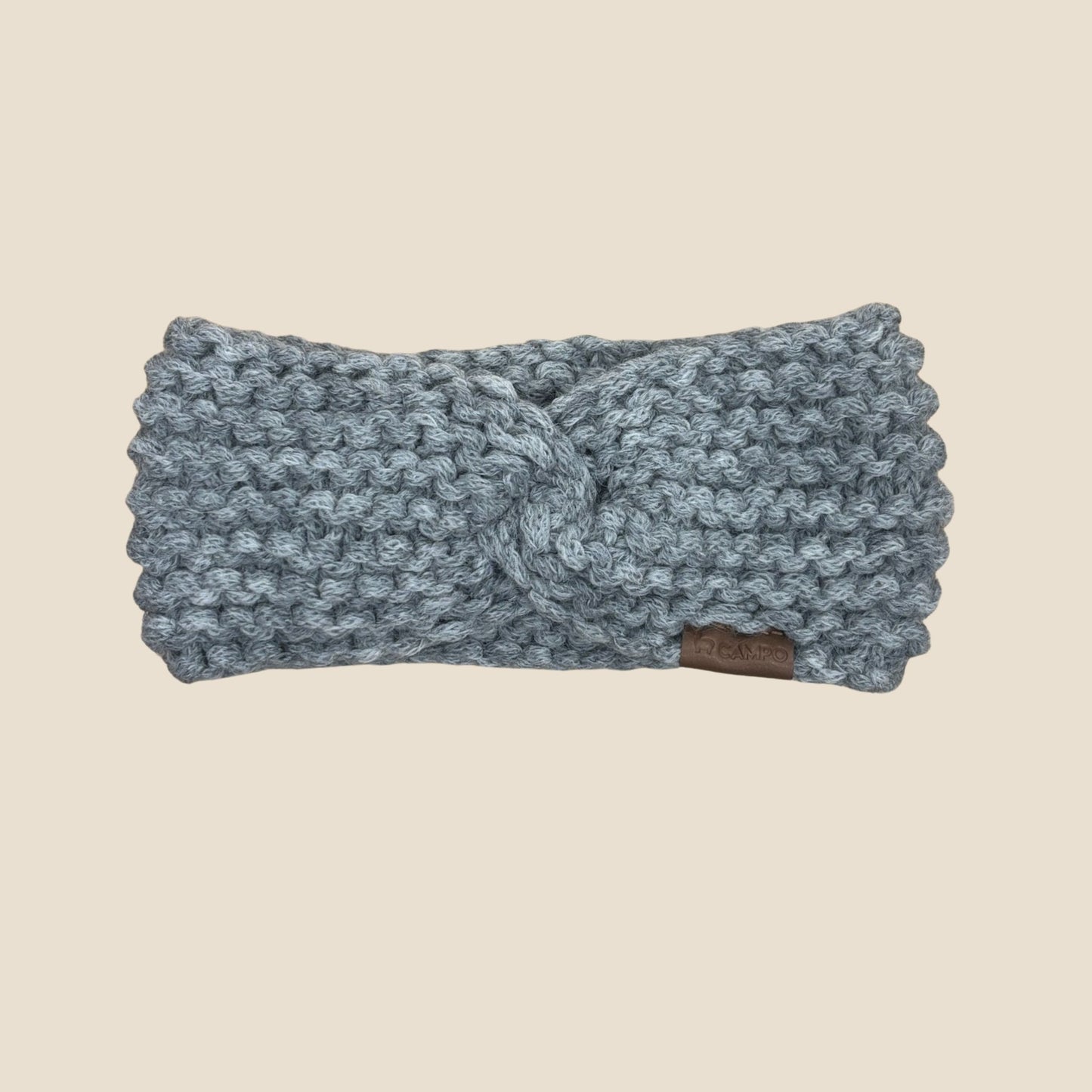 Dark Gray headband with a knot on a beige background