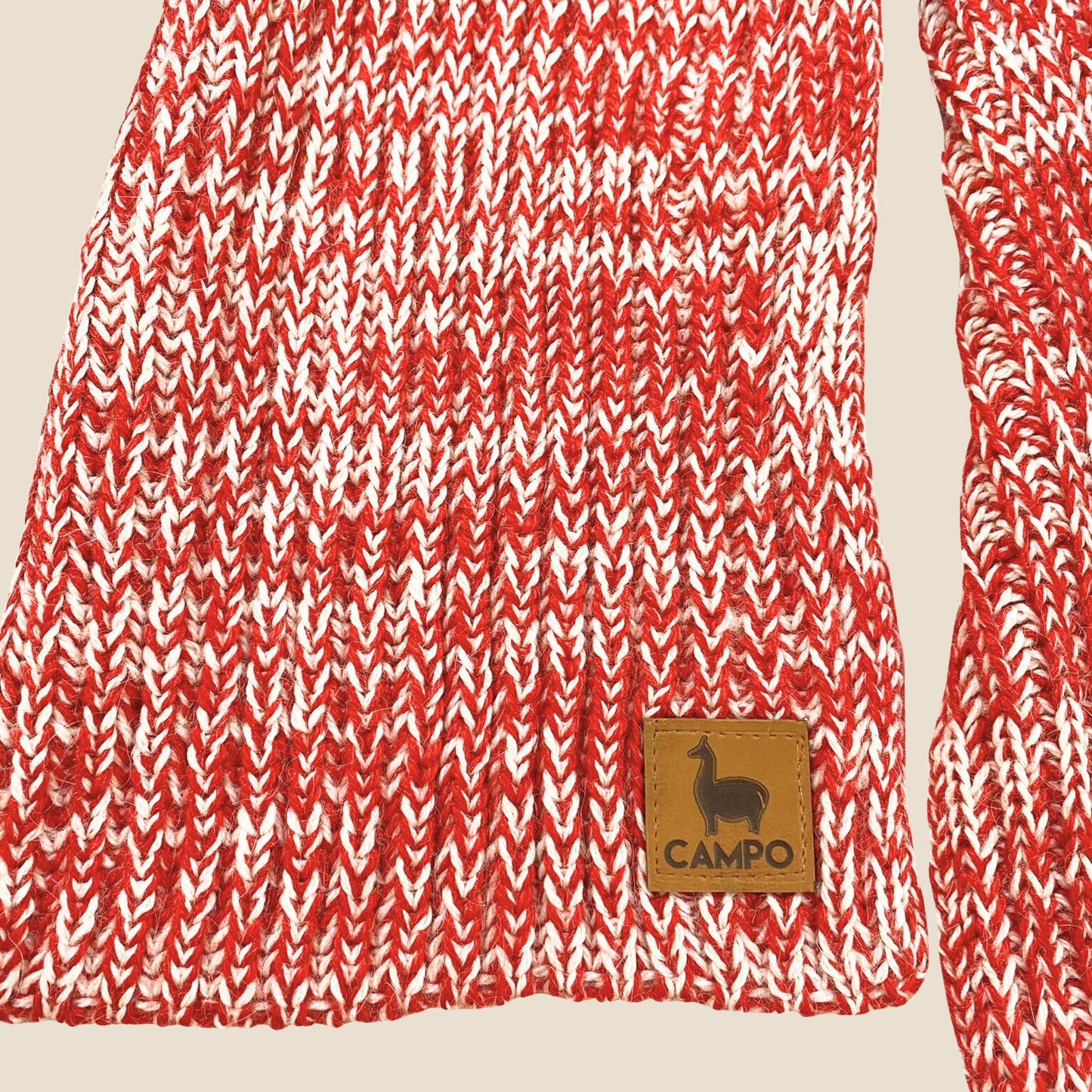 Red and white patterned fabric with a 'Campo' brand label on a beige background
