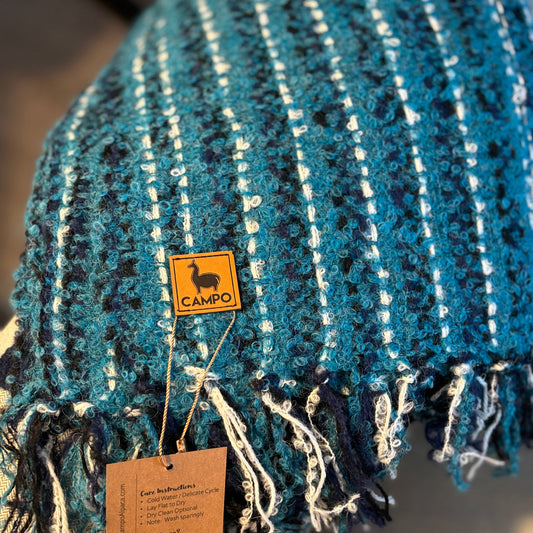 Blue textured fabric with a 'Campo' brand tag and label.