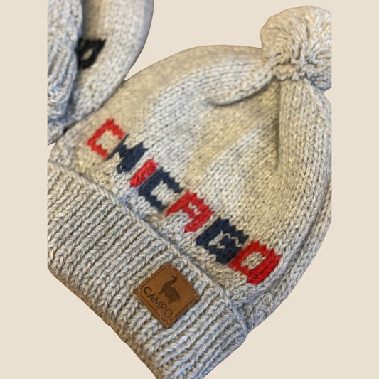 Knitted hat with 'CHICAGO' text and Campo logo on a beige background