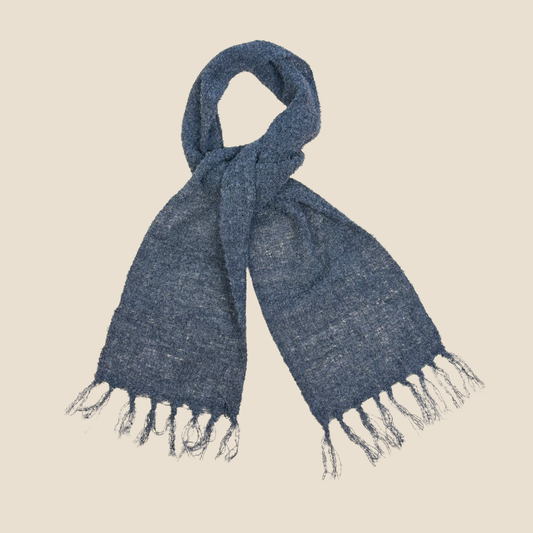 charcoal with fringes on a beige background