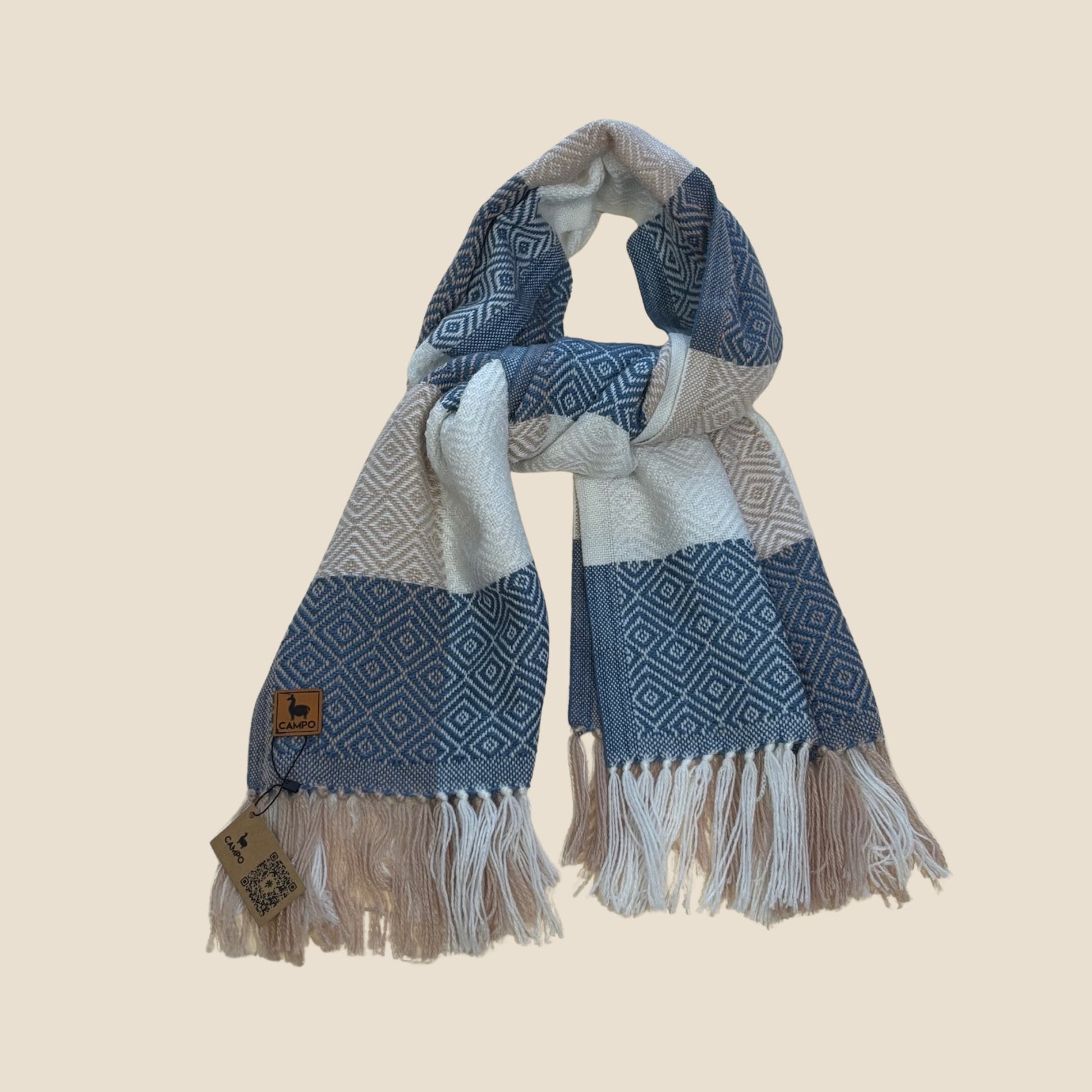 Patterned scarf with fringes on a beige background