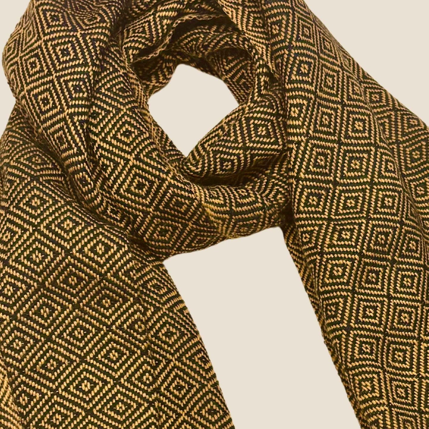 Patterned scarf with geometric design on a beige background